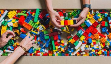 People building with blocks