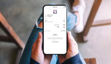 Person looking at a digital receipt on their phone